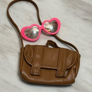 Our generation brown school bag and heart sunglasses
